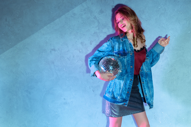  portrait of attractive young woman with disco ball  - Φωτογραφία, εικόνα