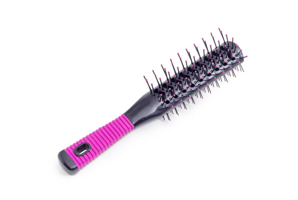 Hairbrush with plastic bristles on a white background - Photo, Image