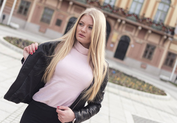 young and attractive girl with long blond hair and blue eyes - Fotografie, Obrázek