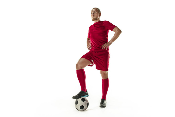 Professional football soccer player with ball isolated white background - Fotó, kép