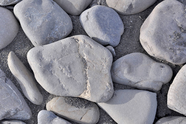 Kleine zee stenen, grind. Achtergrond - Foto, afbeelding