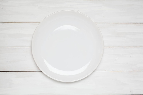 Empty plate top view on - Zdjęcie, obraz