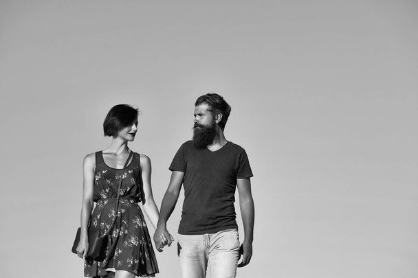 Young couple on blue sky - Fotó, kép
