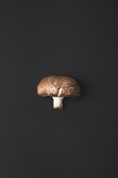 top view of champignon mushroom isolated on black - Photo, Image