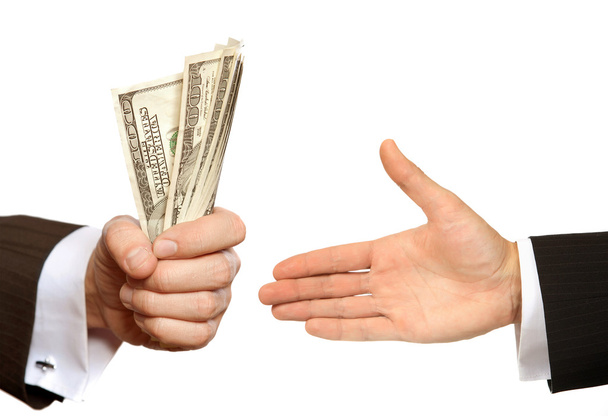 Hand with money isolated on white background - Photo, Image