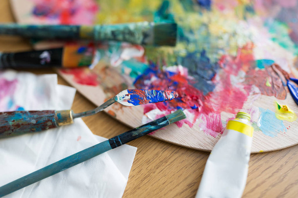palette knife or spatula, brushes and paint tube - Photo, Image