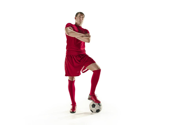 Professional football soccer player with ball isolated white background - Фото, изображение