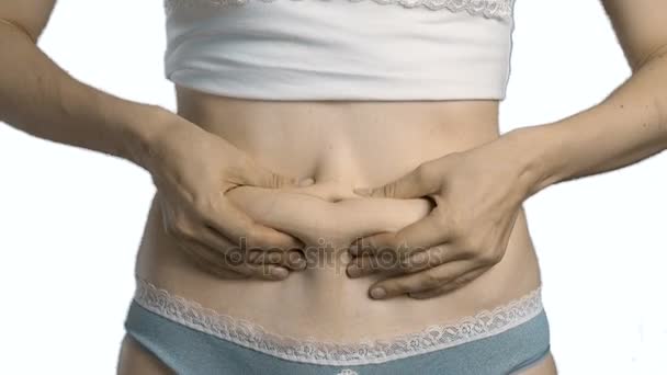žena dotýká břicho - Záběry, video