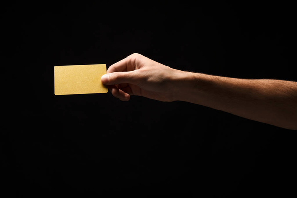 Closeup of male hand holding blank plastic card - Foto, immagini