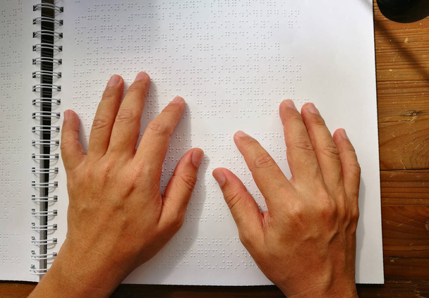 Top View Finger Touch To Braille Code, Blind Man Read Book Written In Braille.  - Zdjęcie, obraz