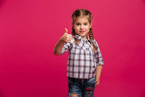 Happy little girl child showing thumbs up. - Fotografie, Obrázek