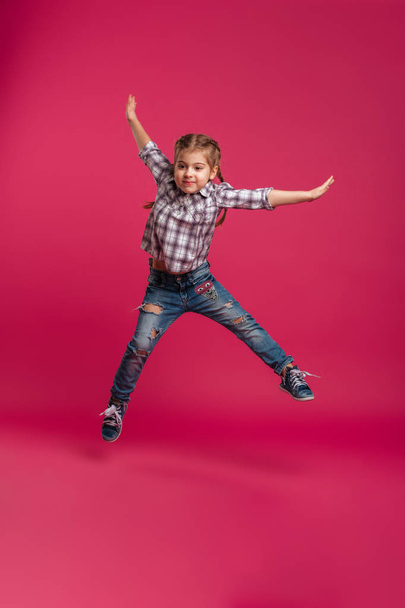 Little girl child jumping isolated - Foto, imagen