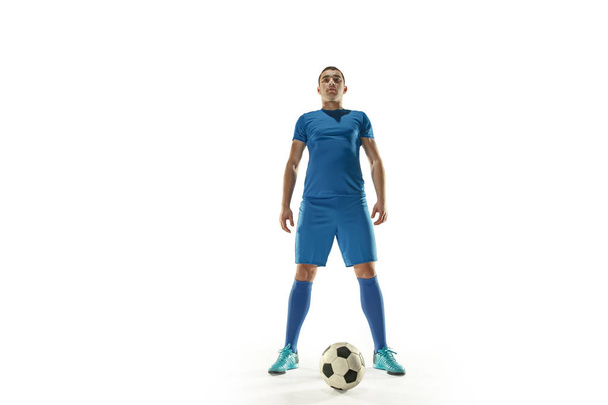 Professional football soccer player with ball isolated white background - Photo, image