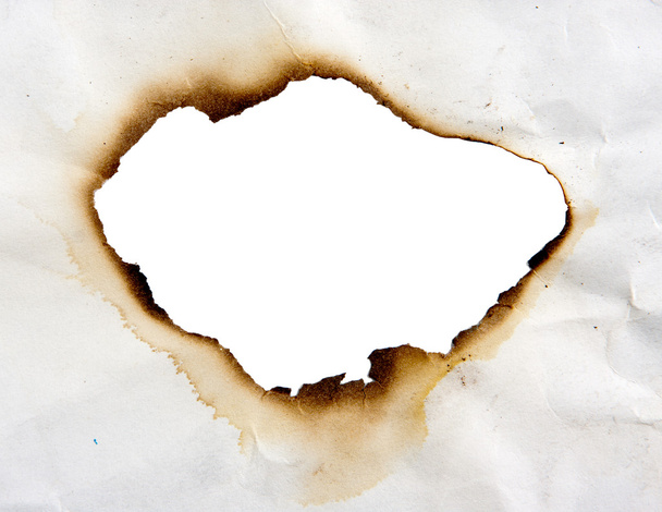 Burned hole in paper - Foto, Bild