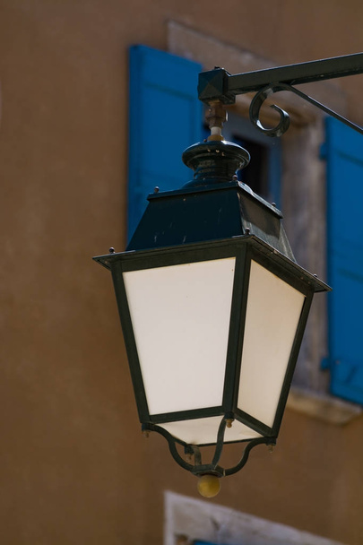 French style old vintage iron with glass street light in small village in Provence, France - Photo, Image