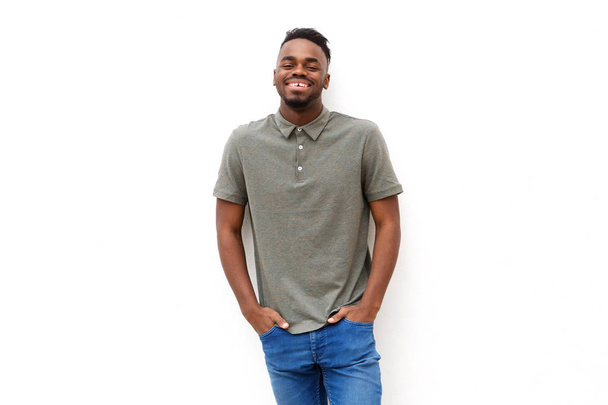 Portrait of happy young african man smiling against isolated white background - Photo, Image