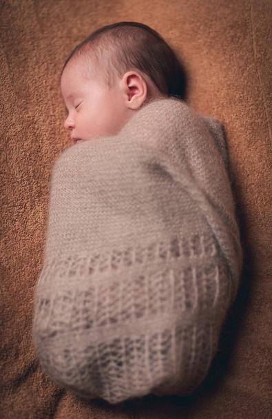 beautiful sweet newborn baby sleeping on a blanket - Zdjęcie, obraz