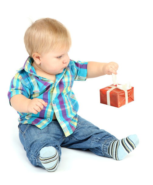 Little boy with gift, isolated on white - Fotó, kép