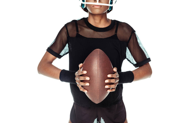 cropped shot of female american football player with ball isolated on white - Foto, Imagem