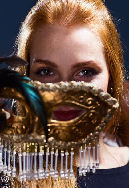 Beautiful woman with gold venetian mask - Fotoğraf, Görsel