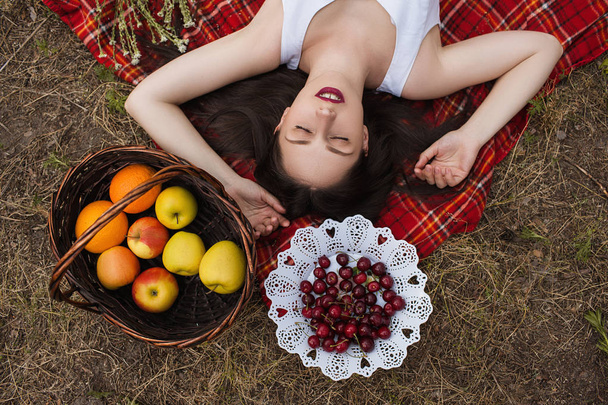 Healthy pretty woman nature picnic pelax concept. - 写真・画像