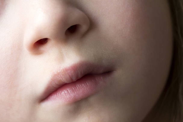Gyermek lány száj és orr makró közelről - Fotó, kép