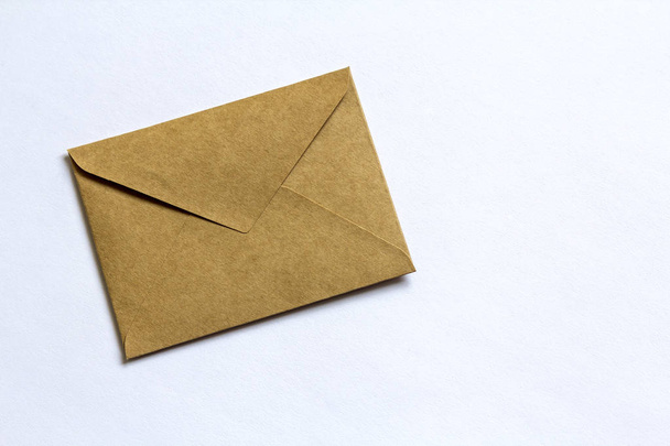Paper brown letter envelope on white background - Φωτογραφία, εικόνα