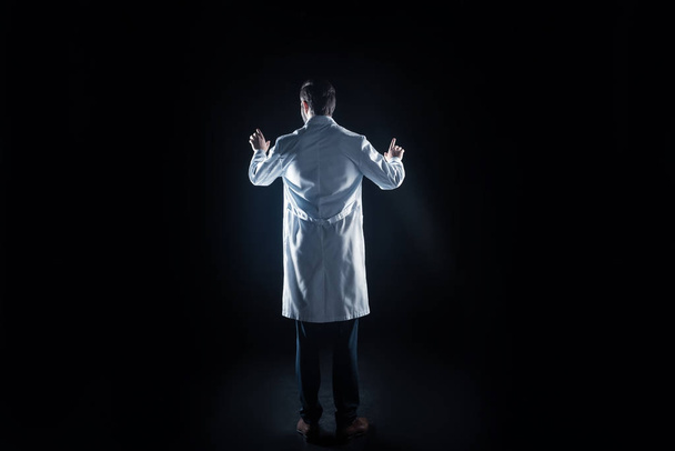 Professional nice scientist wearing labcoat - Фото, зображення