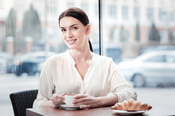 Beautiful brunette female having morning coffee - Foto, Imagem