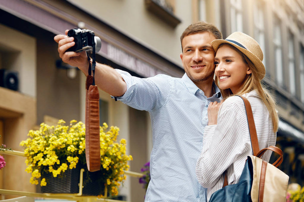 Tourist Couple In Love Taking Photos During Travel. - Photo, Image