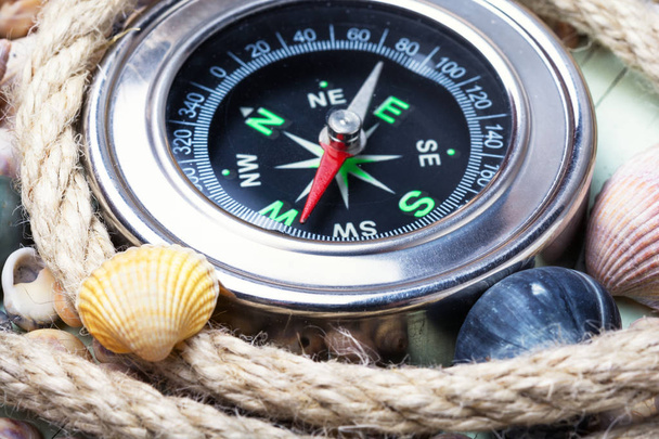 Морской компас и ракушки
 - Фото, изображение