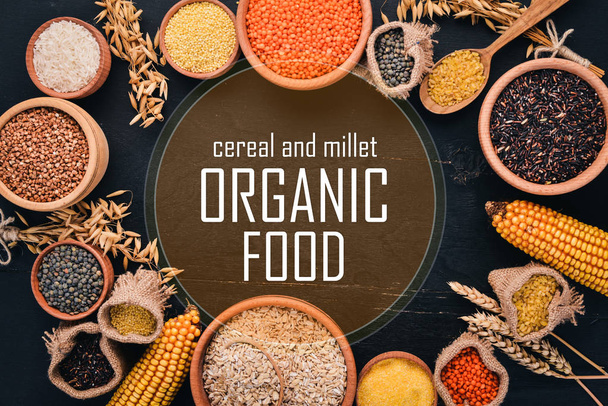 Cereal and millet. Organic food. Buckwheat, lentils, rice, millet, barley, corn, black rice. Top view. - Fotoğraf, Görsel