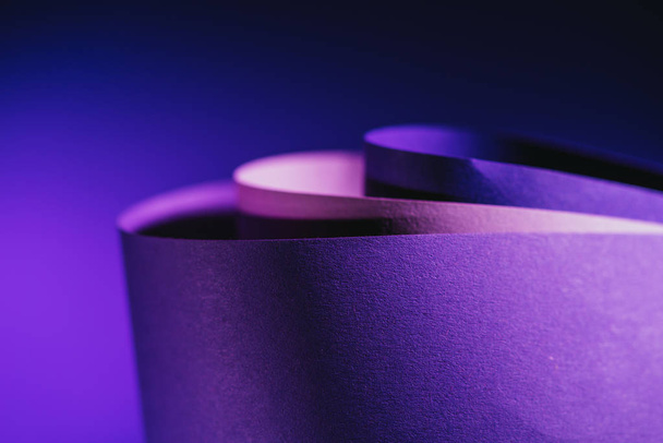 close up view of arcs of purple and pink paper on purple  - Photo, Image