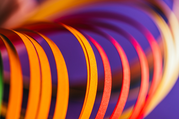 close up of yellow and red quilling paper curves on purple - Photo, Image