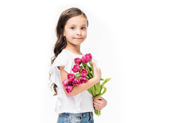 portrait of cute child with bouquet of flowers in hands isolated on white, mothers day concept - Фото, зображення