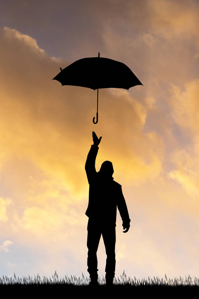illustration of man with umbrella at sunset - Zdjęcie, obraz