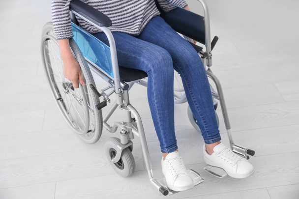 Woman in wheelchair indoors - Foto, Imagen