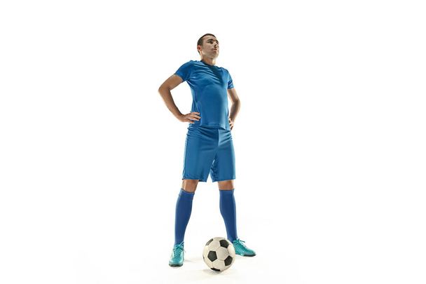 Professional football soccer player with ball isolated white background - Foto, Imagem