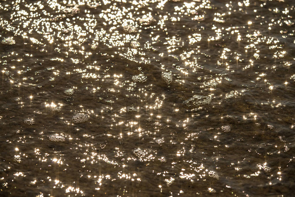 Water of the sea with sun reflections - Photo, Image