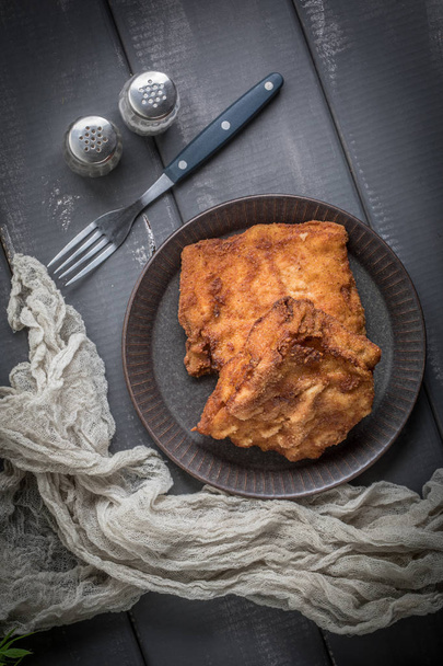 Two fried cod fillet pieces. - Foto, afbeelding