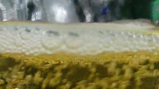 Beer is poured in a glass. - Footage, Video
