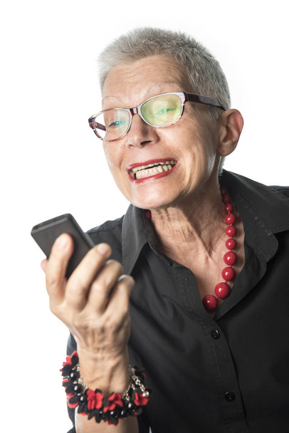 Old lady yelling at her cell phone - Foto, immagini