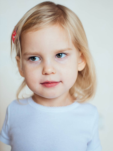 Portrait of emotional little girl. Happy blonde child - Foto, Imagen