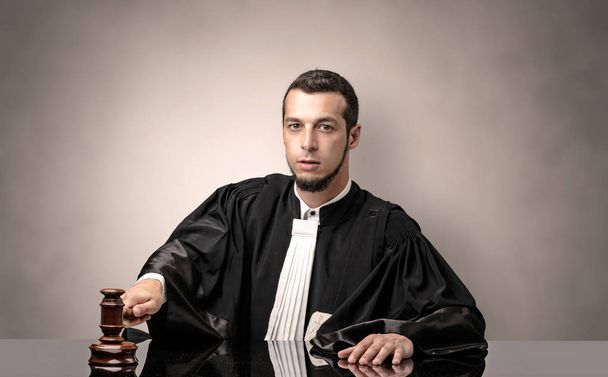Oldscool young judge in gown - Фото, изображение
