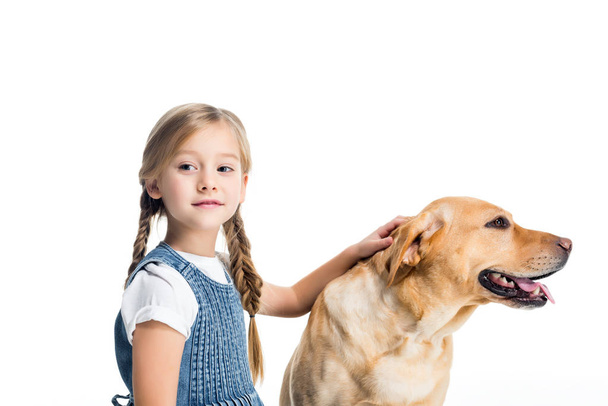 adorable child with golden retriever dog, isolated on white - Fotografie, Obrázek