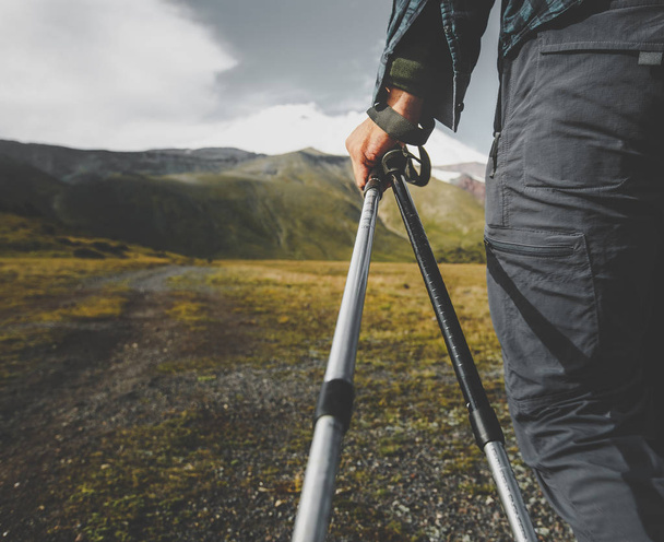 Traveler Man With Trekking Poles, Rear View Closeup. Tourism Lifestyle Mountains Concept - Фото, изображение