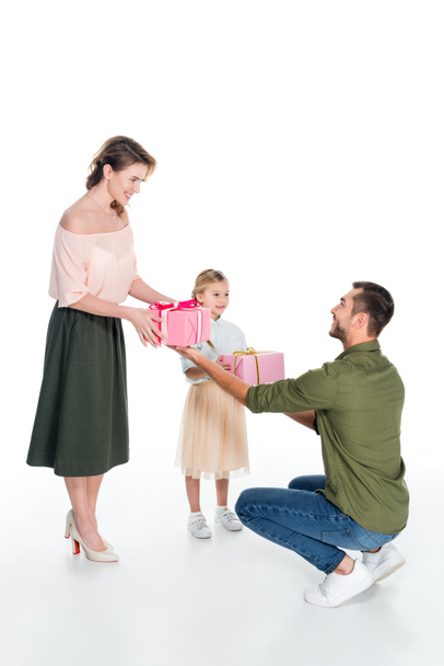 man presenting gifts to family isolated on white, international womens day concept - Φωτογραφία, εικόνα