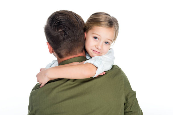 little daughter hugging father isolated on white - Fotó, kép