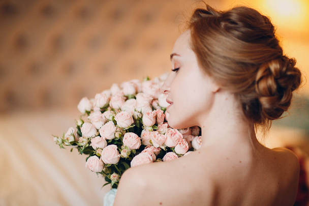 Pretty young female and flowers - Photo, image