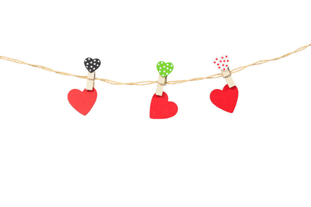 vHandmade three wood hearts hanging on cloth line or rope - Photo, Image